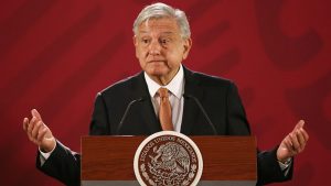 mexico_amlo_lectern_shrugging_stk_747x420